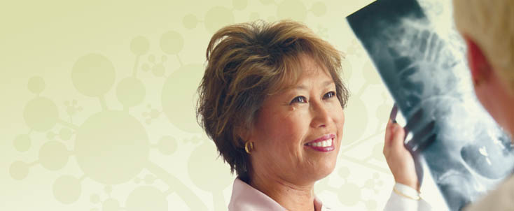 Doctor and patient viewing xray