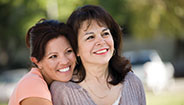 Mother and Daughter hugging Mother and Daughter hugging