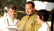 Doctors looking at patients records Doctors looking at patients records