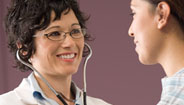 Doctor and patient smiling Doctor and patient smiling
