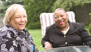 Women Sitting at a Table Women Sitting at a Table