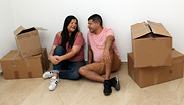 man and woman sitting with boxes man and woman sitting with boxes