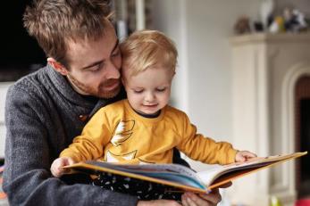 kid reading book