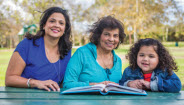 Family Reading a book Family Reading a book