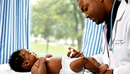 Doctor and infant child