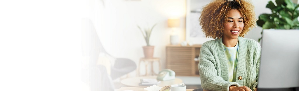 woman looking at covid at-home test kit