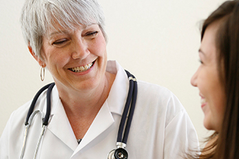 doctor talking to patient