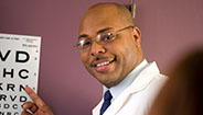 doctor giving eye exam