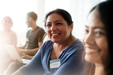 women listening in meeting