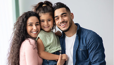 parents and child smiling