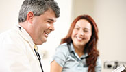 Doctor and patient smiling