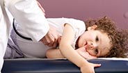 Child getting a check up Child getting a check up