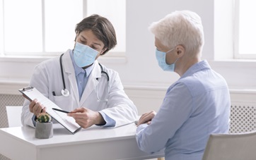 doctor showing patient a chart