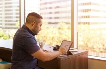 Teenager on a laptop computer
